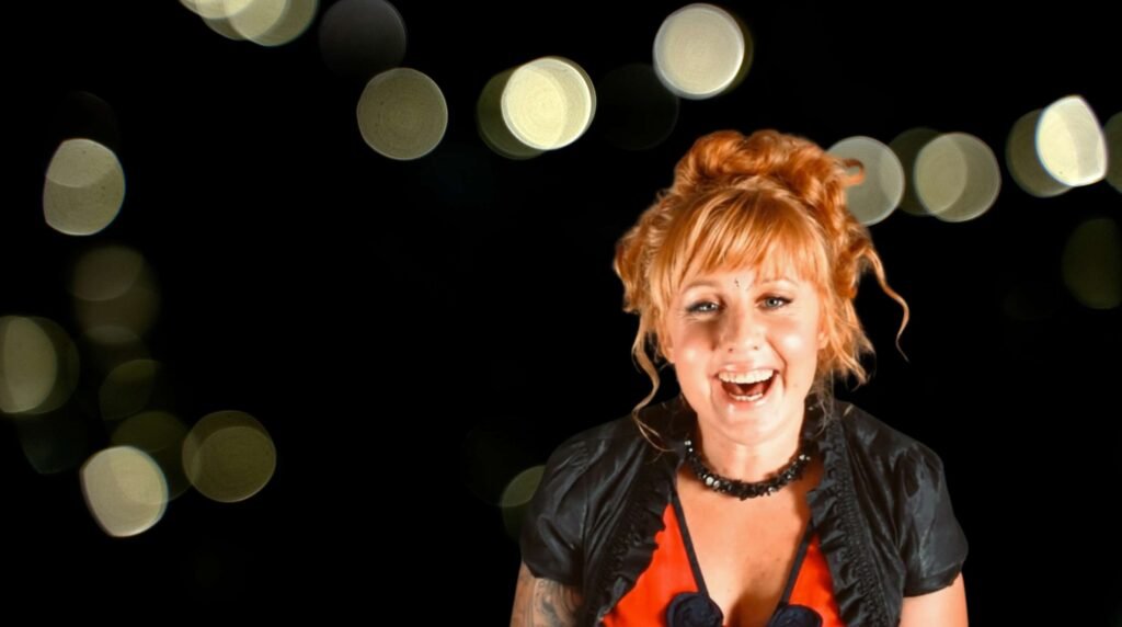 talitha smiling banner blurred background