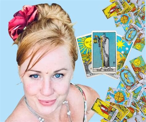talitha redhead with blue eyes with tarot cards